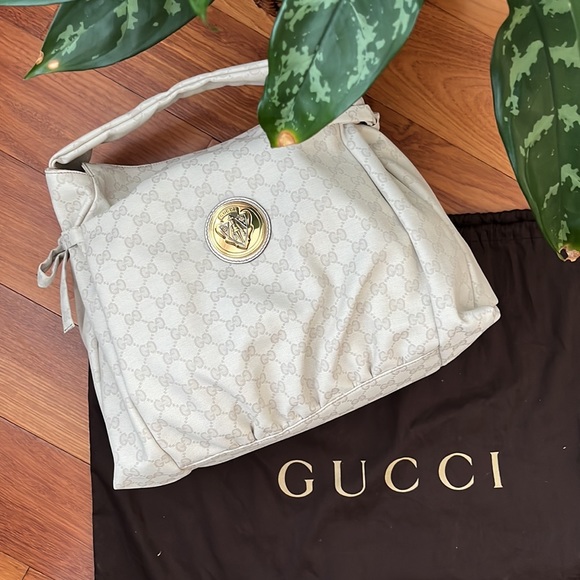 Gucci Handbags - Gucci GG Canvas Hysteria Hobo Purse